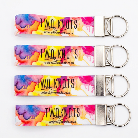 Two Knots keyrings photographed on a white studio background